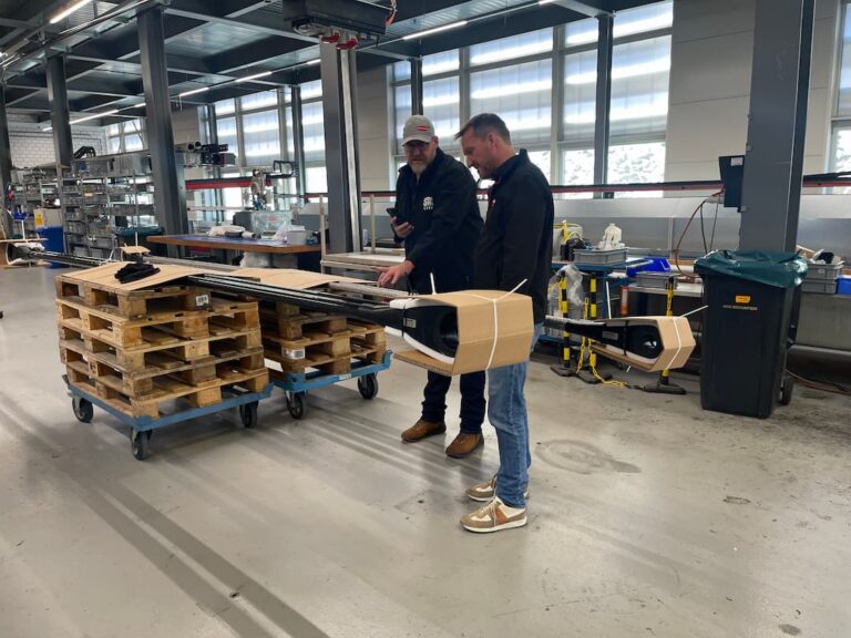 Luke and Arne Inspecting Rods IMG_1027